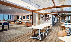 an inside view of an open concept commercial workspace with commercial property insurance coverage