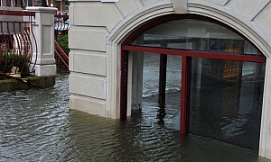 ground level of commercial business property flooded covered with commercial property coverage
