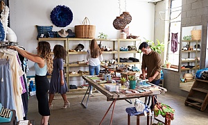 people shopping in a small shop