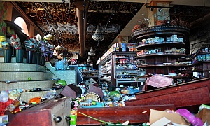 the aftermath of a corner store after it suffered from flood damage