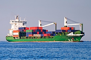 Cargo ship at sea with shipping containers