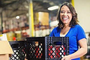 women carrying crate with a policy for small business