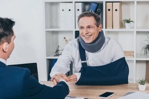 injured employee working in office