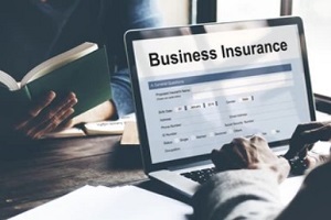 man checking business insurance