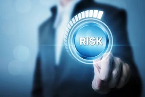 man clicking on risk meter