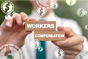 man holding worker compensation wooden blocks