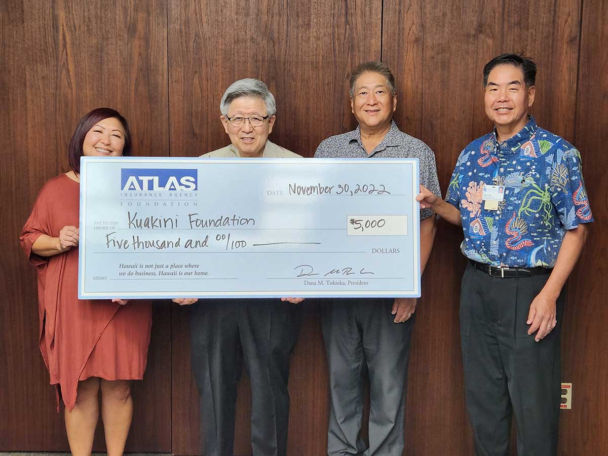 atlas insurance gives kuakini foundation a donation for their charitable services
