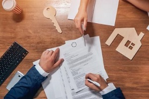 man reading commercial property documents