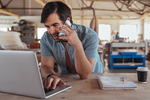 small business owner calling their business insurance provider over the phone