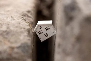 home wooden dummy stuck between bricks