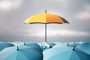 yellow umbrella in blue umbrella