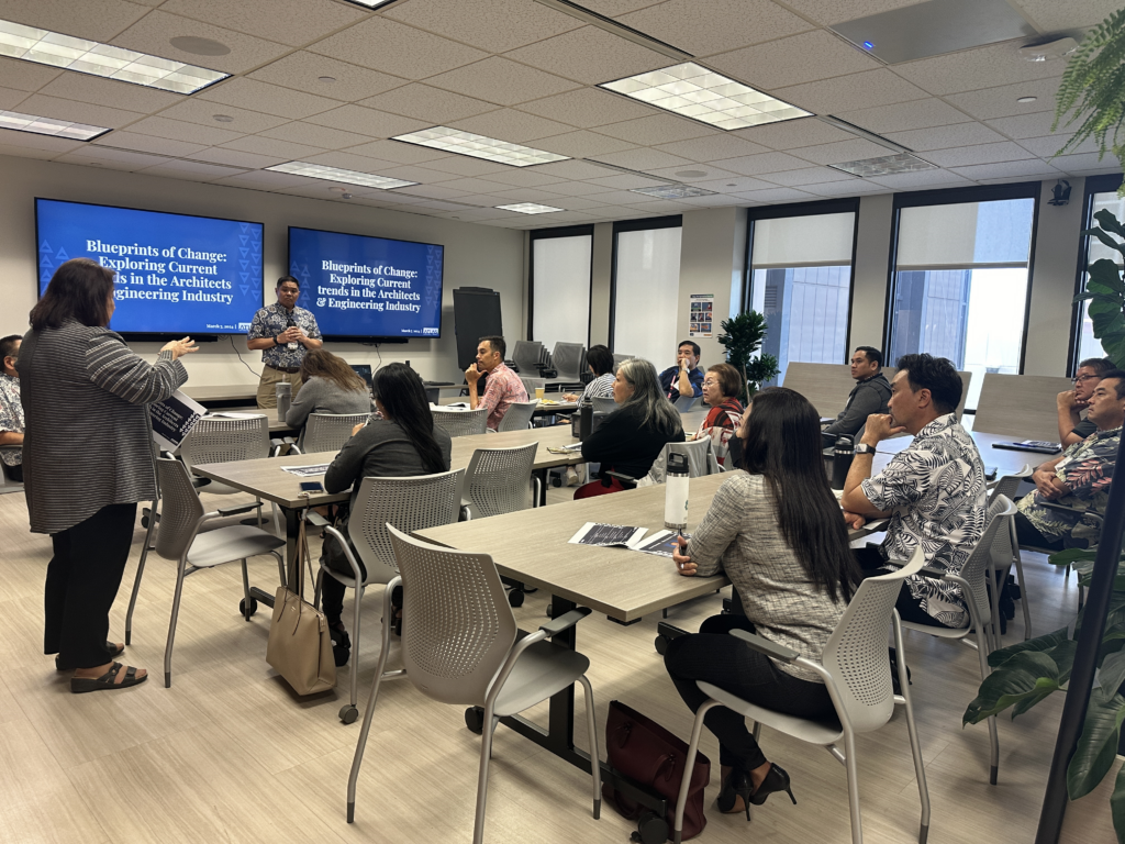 This is a picture of Atlas Insurance Agency's Architects and Engineering Seminar featuring attendees of the event sitting and listening to the speaker