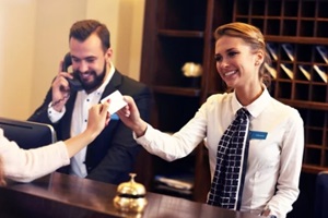 guests getting key card in hotel