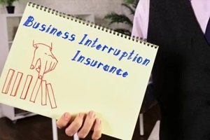 conceptual photo about Business Interruption Insurance with handwritten text