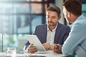 meeting, tablet and business people in office workplace