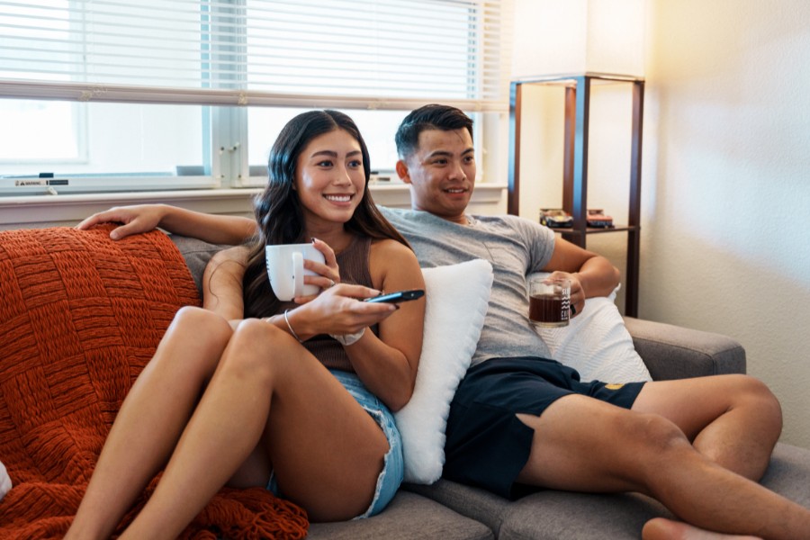 an individual relaxing in his home after buying Hawaii personal insurance