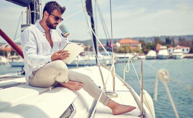 relaxed business owner working on the yacht in Hawaii