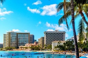 waikiki beach, with its many resorts under blue sky and white sand, makes it one of the world's most famous beaches