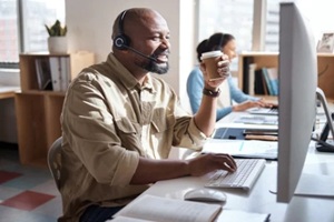 hawaii non-profit insurance agent on phone wit NGO founder