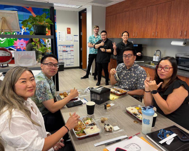 photo of out account executive team enjoying bentos