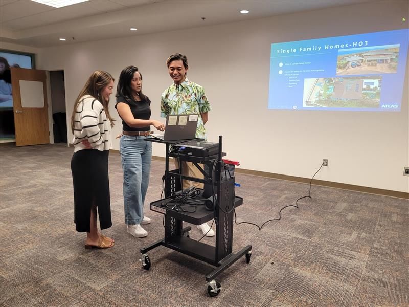 this is a photo of Atlas employees at the first time home buying seminar