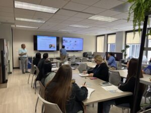 this is a photo of the Hawaii Homeownership Center giving a seminar on First time Home Buying process at Atlas Insurance Agency.