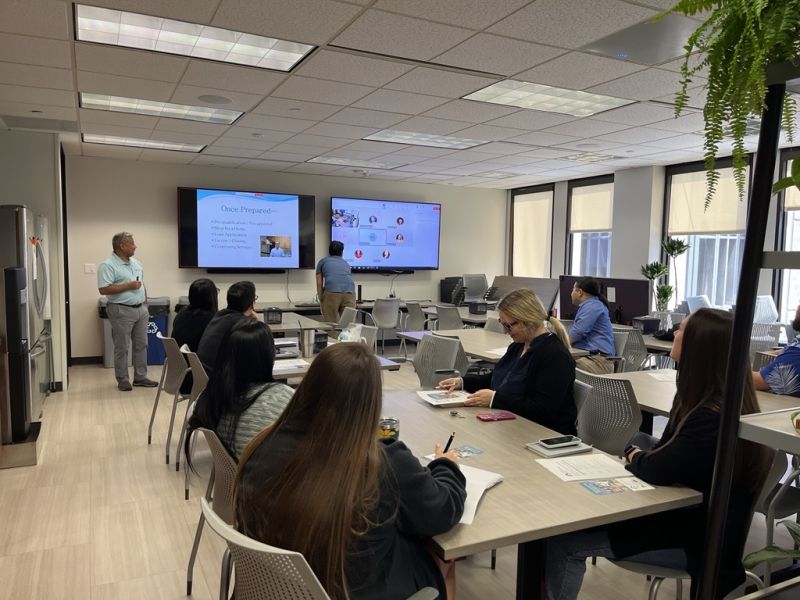 this is a photo of the Hawaii Homeownership Center giving a seminar on First time Home Buying process at Atlas Insurance Agency.