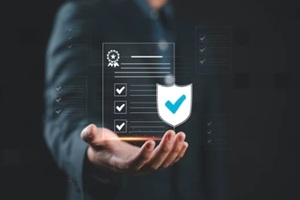 businessman checking steps through document with a list of checkboxes