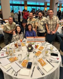 this is a photo of Atlas employees at HUGS annual gala