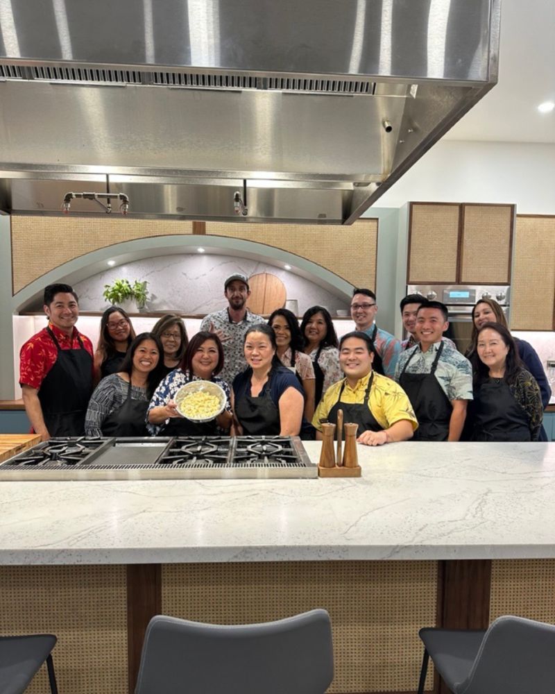 a photo of island insurance and atlas insurance employees at a cooking event sponsored by Island at Hana Kitchens