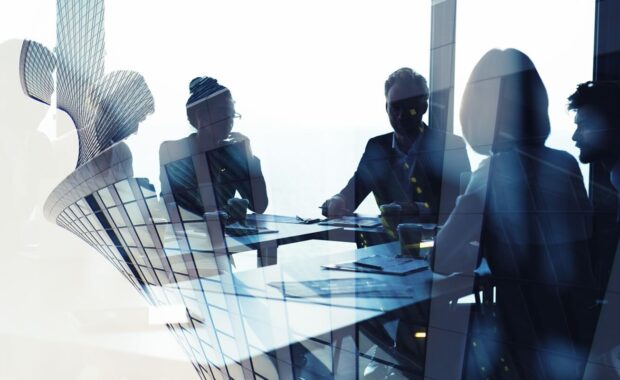 background concept with Hawaii business people discussing risk management strategy