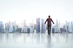 businessman looking at city