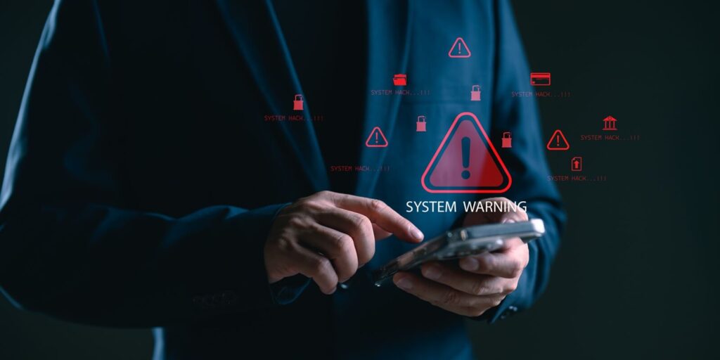 Hawaii non-profit insurance agent using smartphone facing system warning and cyber attack alert