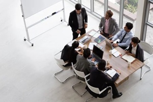 top view of group of multiethnic busy people working in an office