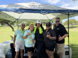 this is a picture of Atlas's Kim Soares at the NAWIC golf tournament.