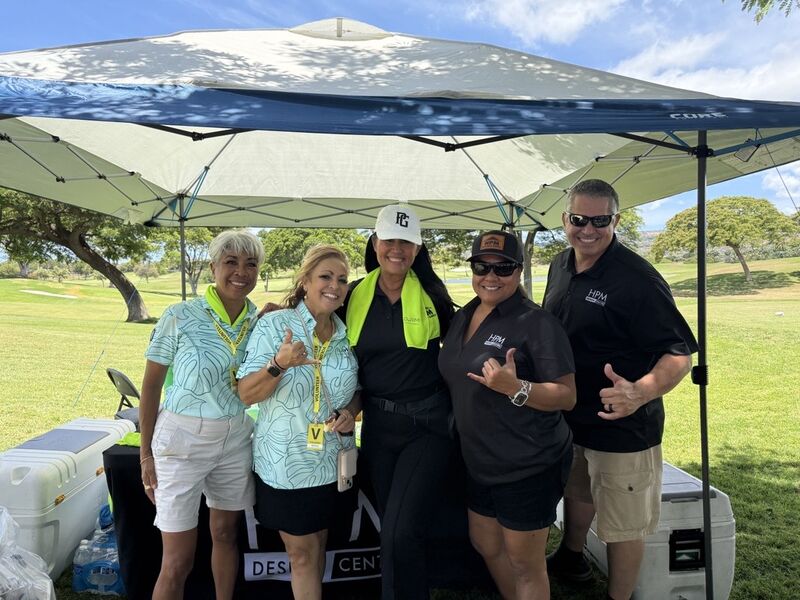 this is a picture of Atlas's Kim Soares at the NAWIC golf tournament.