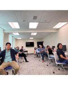 this is a picture of atlas insurance employees playing league of legends