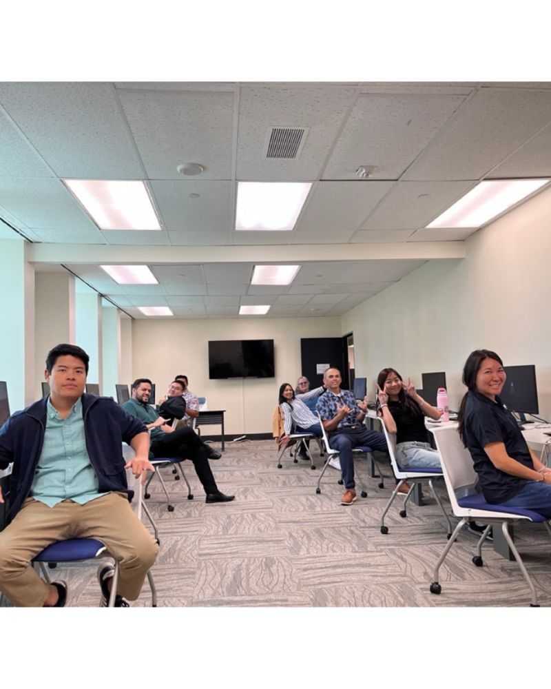 this is a picture of atlas insurance employees playing league of legends