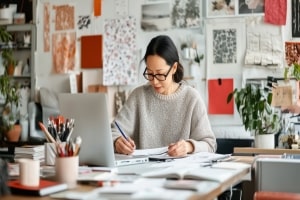Freelancer Working at Home Office in A Motivational Work Environment
