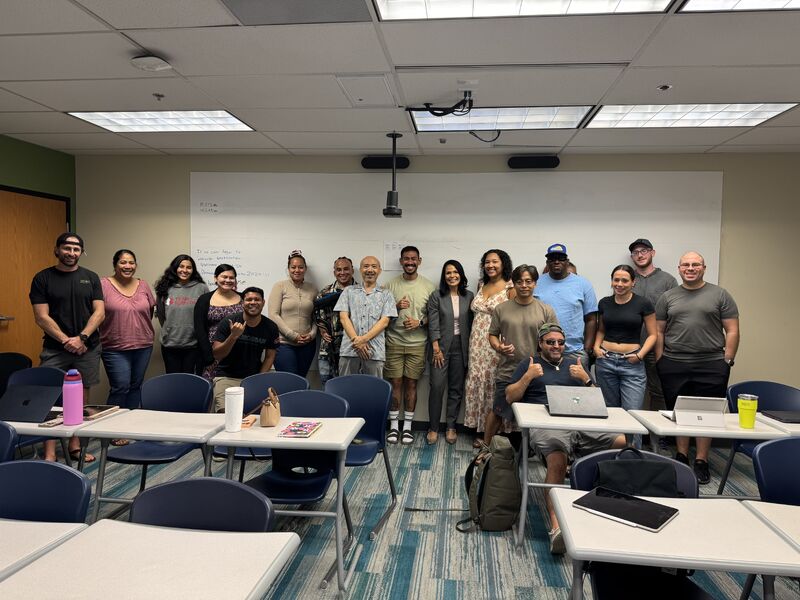 Smiling HPU students at a seminar run by an Atlas Team Member