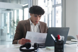 Business Owner Gathering Documents for Insurance Claim