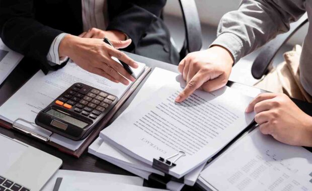 Businessmen Discussing Insurance Plan After Hiring New Employees