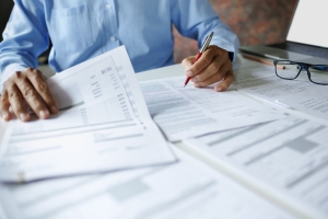 Businessman Checking Insurance Options for Non-Profit