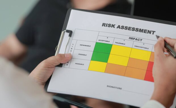 Person Doing Risk Assessment to Lower Nonprofit Insurance Premiums