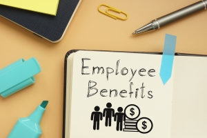 Employee Benefits Concept Represented by Text and Employee Icons with Money