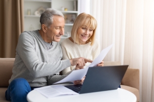 Senior Couple Checking Financial Strength of Insurance Carriers